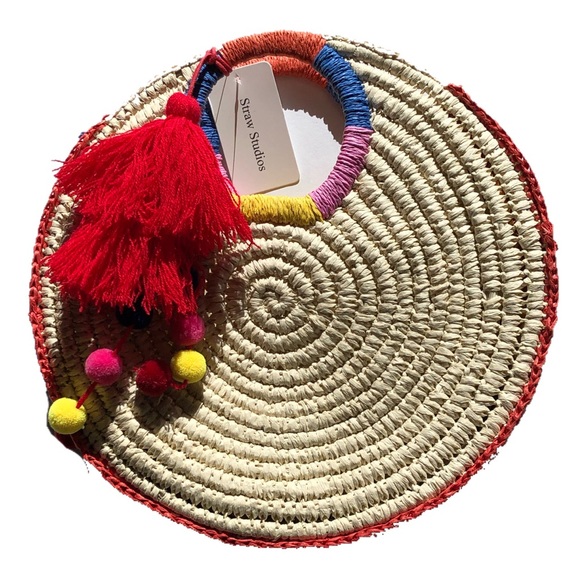 Straw Studios Handbags - NWT Straw Circle Clutch Purse with Fringe